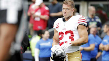 Sep 7, 2025; Seattle, Washington, USA; San Francisco 49ers running back Christian McCaffrey (23) looks on during warmups before the game against the Seattle Seahawks at Lumen Field.