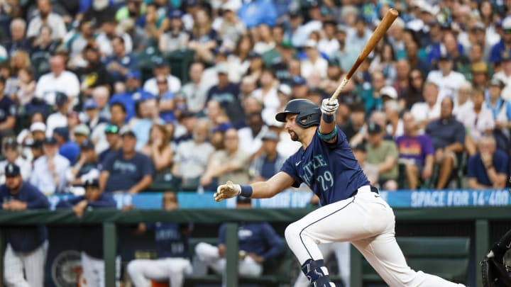 Seattle Mariners catcher Cal Raleigh (29) hits a single against the Detroit Tigers during the fourth inning at T-Mobile Park on Aug 8.