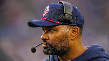Dec 28, 2024; Foxborough, Massachusetts, USA; New England Patriots head coach Jerod Mayo watches from the sideline as they take on the Los Angeles Chargers at Gillette Stadium. Mandatory Credit: David Butler II-Imagn Images