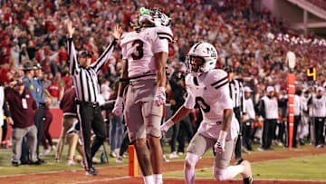 Nov 1, 2025; Fayetteville, Arkansas, USA; Mississippi State Bulldogs wide receiver Anthony Evans III (3) celebrates after scoring a touchdown during the fourth quarter against the Arkansas Razorbacks at Donald W. Reynolds Razorback Stadium. Bulldogs won 38-35. Mandatory Credit: Nelson Chenault-Imagn Images