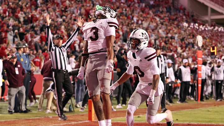 Nov 1, 2025; Fayetteville, Arkansas, USA; Mississippi State Bulldogs wide receiver Anthony Evans III (3) celebrates after scoring a touchdown during the fourth quarter against the Arkansas Razorbacks at Donald W. Reynolds Razorback Stadium. Bulldogs won 38-35. Mandatory Credit: Nelson Chenault-Imagn Images