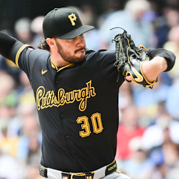 Jun 25, 2025; Milwaukee, Wisconsin, USA;  Pittsburgh Pirates starting pitcher Paul Skenes (30) throws a pitch in the first inning against the Milwaukee Brewers at American Family Field. Mandatory Credit: Benny Sieu-Imagn Images