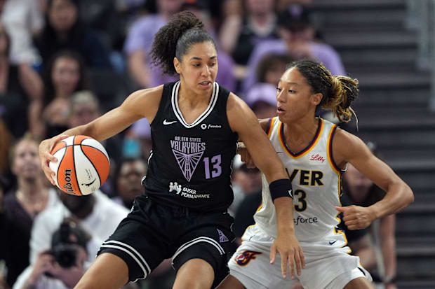 Golden State Valkyries forward Janelle Salaun dribbles against Indiana Fever guard Aerial Powers. 