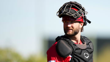 Cincinnati Reds non-roster invitee catcher Michael Trautwein walks back to the plate in the bullpen during spring training workouts, Thursday, Feb. 15, 2024, at the team   s spring training facility in Goodyear, Ariz.