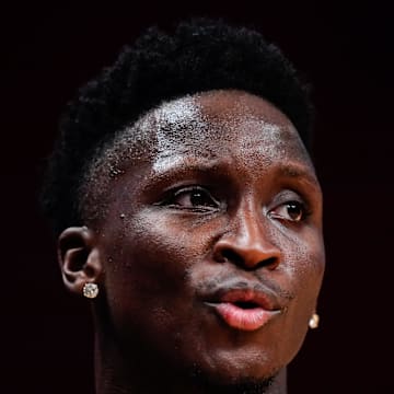 Nov 7, 2022; Miami, Florida, USA; Miami Heat guard Victor Oladipo (4) warms up prior to a game against the Portland Trail Blazers at FTX Arena. Mandatory Credit: Rich Storry-Imagn Images