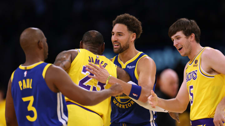 Chris Paul and Klay Thompson, Golden State Warriors and LeBron James and Austin Reaves, Los Angeles Lakers
