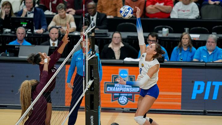 Dec 18, 2025; Kansas City, MO, USA; Pittsburgh Panthers outside hitter Blaire Bayless (8) hits the ball during the first set against the Texas A&M Aggies in a 2025 NCAA Women’s Volleyball Championship semifinal match at T-Mobile Center. Mandatory Credit: Jay Biggerstaff-Imagn Images Dec 18, 2025; Kansas City, MO, USA; Pittsburgh Panthers outside hitter Blaire Bayless (8) hits the ball during the first set against the Texas A&M Aggies in a 2025 NCAA Women’s Volleyball Championship semifinal match at T-Mobile Center. Mandatory Credit: Jay Biggerstaff-Imagn Images