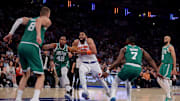 May 16, 2025; New York, New York, USA; New York Knicks center Karl-Anthony Towns (32) drives to the basket against Boston Celtics centers Kristaps Porzingis (8) and Al Horford (42) and guards Jaylen Brown (7) and Derrick White (9) during the first quarter of game six in the second round of the 2025 NBA Playoffs at Madison Square Garden. Mandatory Credit: Brad Penner-Imagn Images