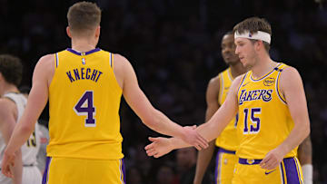  Los Angeles Lakers guard Dalton Knecht (4) and guard Austin Reaves (15) on the court in the first half against the Denver Nuggets at Crypto.com Arena.