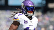 Sep 8, 2024; East Rutherford, New Jersey, USA; Minnesota Vikings safety Josh Metellus (44) runs up field before the game against the New York Giants at MetLife Stadium.