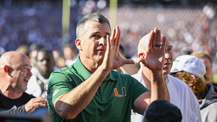 Dec 20, 2025; College Station, TX, USA; Miami Hurricanes head coach Mario Cristobal celebrates as he walks off the field after the Hurricanes win over the Texas A&M Aggies at Kyle Field. Mandatory Credit: Jerome Miron-Imagn Images