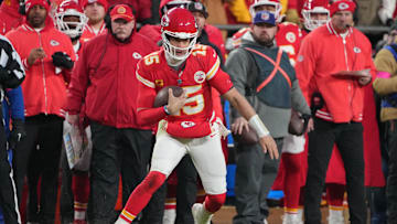 Jan 18, 2025; Kansas City, Missouri, USA; Kansas City Chiefs quarterback Patrick Mahomes (15) runs the ball against the Houston Texans during the fourth quarter of a 2025 AFC divisional round game at GEHA Field at Arrowhead Stadium. Mandatory Credit: Denny Medley-Imagn Images