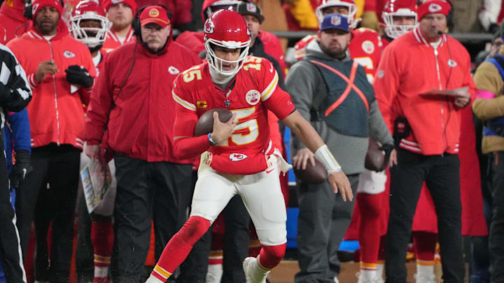 Jan 18, 2025; Kansas City, Missouri, USA; Kansas City Chiefs quarterback Patrick Mahomes (15) runs the ball against the Houston Texans during the fourth quarter of a 2025 AFC divisional round game at GEHA Field at Arrowhead Stadium. Mandatory Credit: Denny Medley-Imagn Images