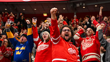 Red Wings fans cheering during the NHL Global Series contest between the Ottawa Senators and Detroit Red Wings.