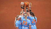 The Lady Vols softball team gather on the field during a NCAA super regionals softball game between the Tennessee Volunteers and Nebraska Cornhuskers at Sherri Parker Lee Stadium in Knoxville, Tenn., on May 25, 2025.