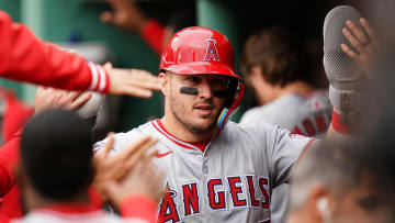 Apr 14, 2024; Boston, Massachusetts, USA; Los Angeles Angels center fielder Mike Trout (27) scores against the Boston Red Sox in the eighth inning at Fenway Park.