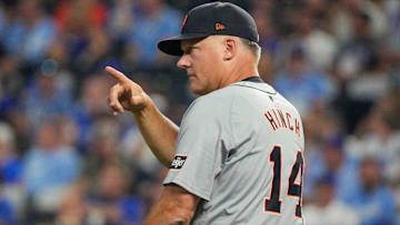 Detroit Tigers manager A.J. Hinch (14) gestures to the bullpen for a pitcher change against the Kansas City Royals in the eighth inning at Kauffman Stadium.