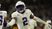 Sep 26, 2025; Tempe, Arizona, USA; TCU Horned Frogs safety Jamel Johnson (2) high-fives cornerback Vernon Glover (26) after a pass breakup in the second half at Mountain America Stadium, Home of the ASU Sun Devils. Mandatory Credit: Jacob Reiner-Imagn Images