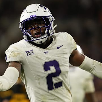 Sep 26, 2025; Tempe, Arizona, USA; TCU Horned Frogs safety Jamel Johnson (2) high-fives cornerback Vernon Glover (26) after a pass breakup in the second half at Mountain America Stadium, Home of the ASU Sun Devils. Mandatory Credit: Jacob Reiner-Imagn Images