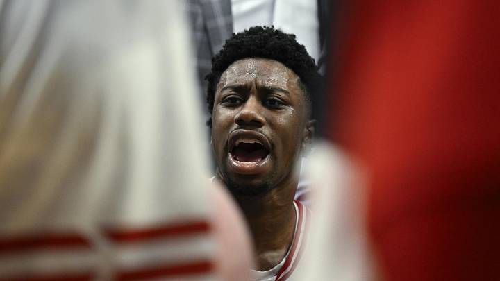 Mar 19, 2026; Portland, OR, USA; Wisconsin Badgers guard John Blackwell (25) talks with teammate in the huddle during the second half of a first round game of the men's 2026 NCAA Tournament against the High Point Panthers at Moda Center. Mandatory Credit: Troy Wayrynen-Imagn Images