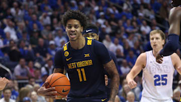 Mar 1, 2025; Provo, Utah, USA; West Virginia Mountaineers guard Jonathan Powell reacts after a rebound against the Brigham Young Cougars during the first half at Marriott Center. Mandatory Credit: Rob Gray-Imagn Images