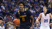 Mar 1, 2025; Provo, Utah, USA; West Virginia Mountaineers guard Jonathan Powell reacts after a rebound against the Brigham Young Cougars during the first half at Marriott Center. Mandatory Credit: Rob Gray-Imagn Images