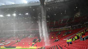 Water fell by the bucketload from the Old Trafford roof on Sunday