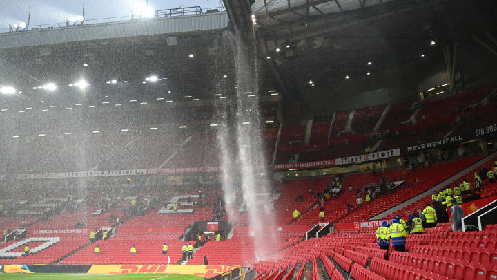 Water fell by the bucketload from the Old Trafford roof on Sunday