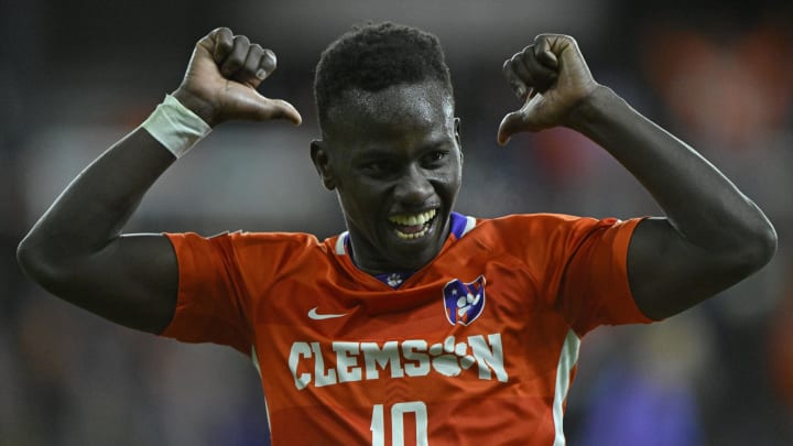 Dec 11, 2023; Louisville, KY, USA; Clemson Tigers midfielder Ousmane Sylla (10) celebrates after scoring a goal against the Notre Dame Fighting Irish during the second half of the College Cup Championship at Lynn Family Stadium. Clemson defeated Notre Dame 2-1. Mandatory Credit: Jamie Rhodes-USA TODAY Sports