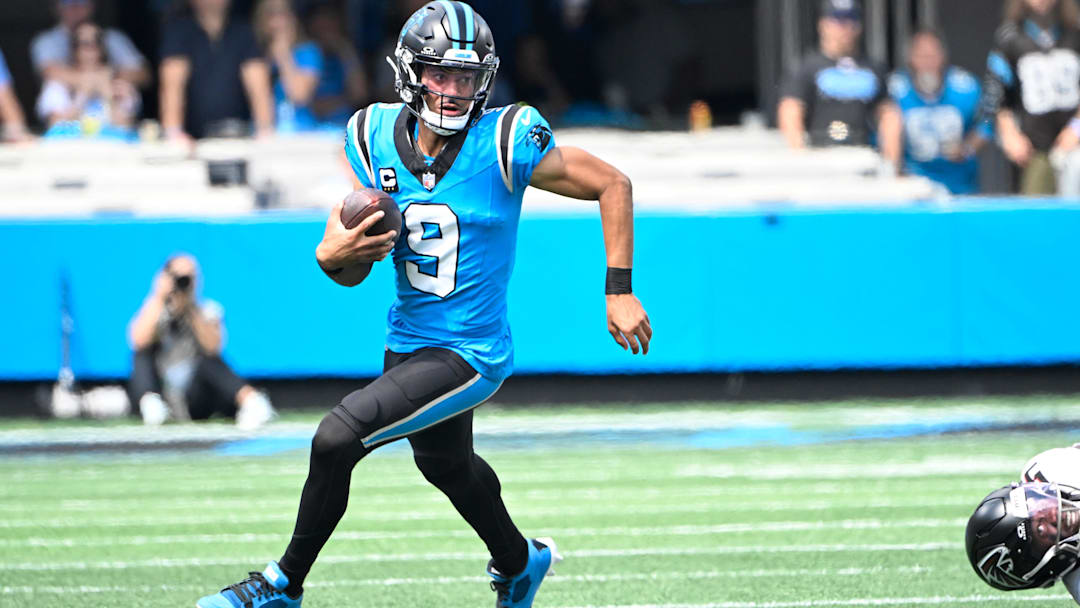 Sep 21, 2025; Charlotte, North Carolina, USA;  Carolina Panthers quarterback Bryce Young (9) runs in the first quarter at Bank of America Stadium. 