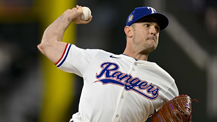 May 2, 2024; Arlington, Texas, USA; Texas Rangers relief pitcher David Robertson (37) pitches against the Washington Nationals during the seventh inning at Globe Life Field. Mandatory Credit: Jerome Miron-Imagn Images