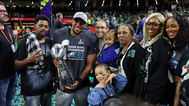 Philadelphia Eagles running back Saquon Barkley celebrates after winning Super Bowl LIX.