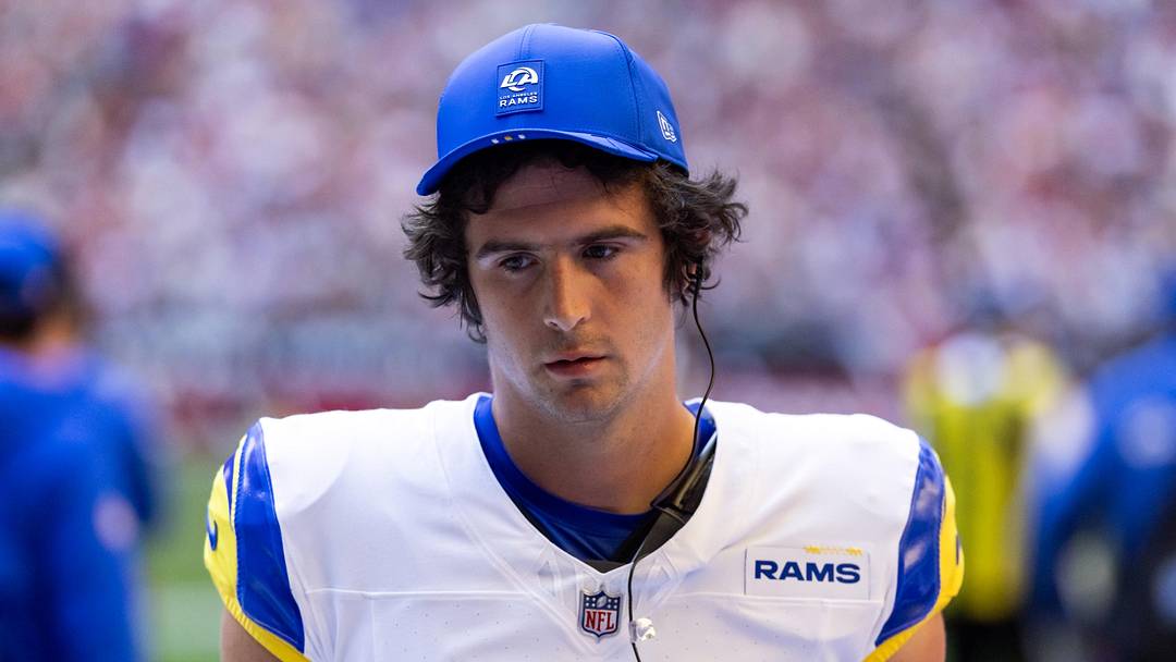 Dec 7, 2025; Glendale, Arizona, USA; Los Angeles Rams quarterback Stetson Bennett IV (13) against the Arizona Cardinals at State Farm Stadium. Mandatory Credit: Mark J. Rebilas-Imagn Images