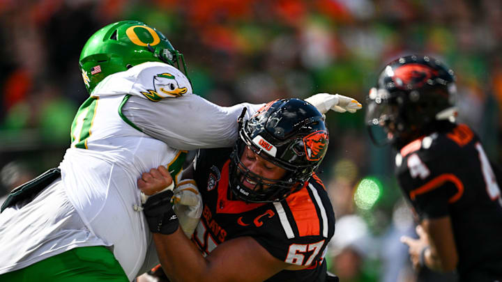 Oregon State Beavers offensive lineman Joshua Gray (67) pushes up against Oregon’s offense during the annual rivalry game on Saturday, Sept. 14, 2024 at Reser Stadium in Corvallis, Ore.