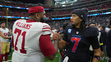 Oct 26, 2025; Houston, Texas, USA; San Francisco 49ers offensive tackle Trent Williams (71) shakes hands with Houston Texans quarterback C.J. Stroud (7) following a game at NRG Stadium. Mandatory Credit: Sean Thomas-Imagn Images