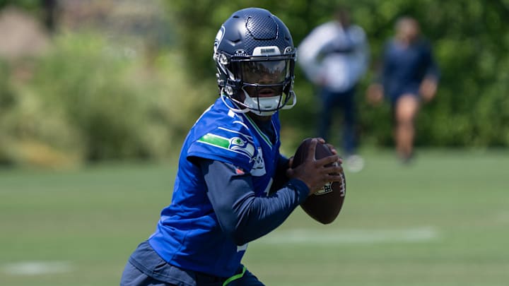 Seattle Seahawks quarterback Jalen Milroe scrambles during mini-camp at Virginia Mason Athletic Center. 