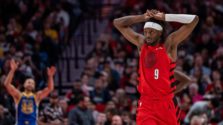 Oct 23, 2024; Portland, Oregon, USA;  Portland Trailblazers shooting forward Jerami Grant (9) reacts during the second half against the Golden State Warriors at Moda Center. Mandatory Credit: Stephen Brashear-Imagn Images