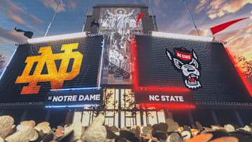 Oct 11, 2025; South Bend, Indiana, USA; Notre Dame Fighting Irish and NC State Wolfpack logos on the scoreboard before the matchup at Notre Dame Stadium. Mandatory Credit: Michael Caterina-Imagn Images