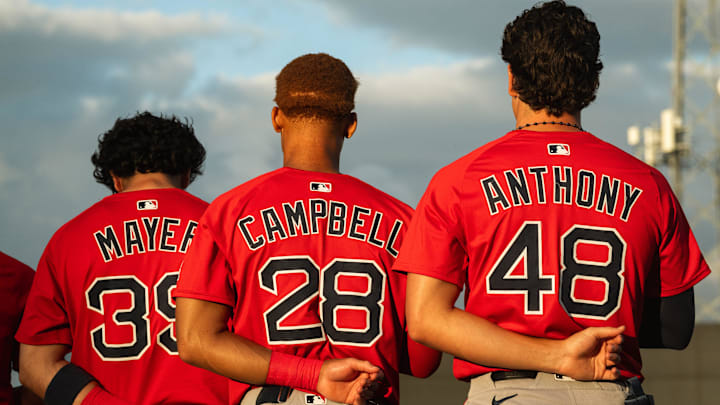 Boston's top-three prospects in Marcelo Mayer, Kristian Campbell, and Roman Anthony stand for the national anthem ahead of a Spring Training breakout game.