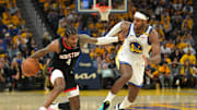 Apr 26, 2025; San Francisco, California, USA; Houston Rockets guard Jalen Green (4) dribbles against Golden State Warriors guard Buddy Hield (7) during the third quarter of game three of first round for the 2024 NBA Playoffs at Chase Center. Mandatory Credit: Darren Yamashita-Imagn Images