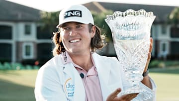 Neal Shipley with the trophy after a fifth playoff hole on the 18th hole after sinking a 38-ft putt and winning the tournament by one stroke at the LECOM Suncoast Classic at Lakewood National Golf Club on April 19, 2025 in Lakewood Ranch, Florida.