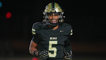 Basha receiver Gio Richardson (5) smiles against ALA Queen Creek during an Open Semifinal game at Dobson High School on Nov. 30, 2024.