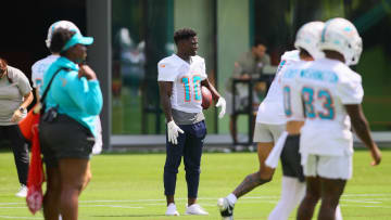 Jun 4, 2024; Miami Gardens, FL, USA; Miami Dolphins wide receiver Tyreek Hill (10) looks on during mandatory minicamp at Baptist Health Training Complex. Mandatory Credit: Sam Navarro-USA TODAY Sports