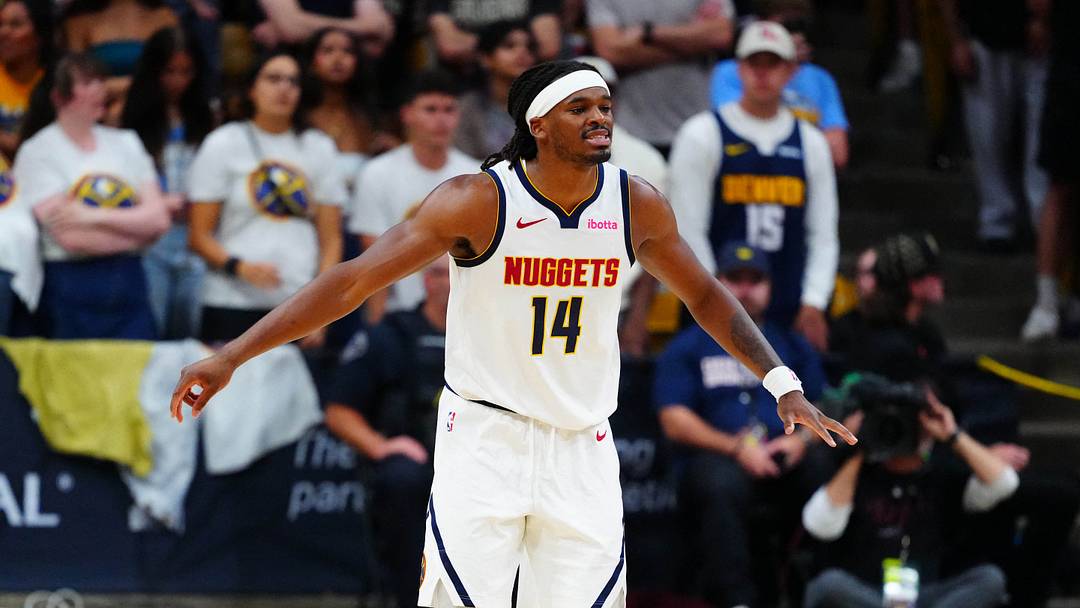 Oct 4, 2026; Boulder, Colorado, USA;  Denver Nuggets forward Daron Holmes II (14) during the second half against the Utah Jazz at CU Events Center.  Mandatory Credit: Ron Chenoy-Imagn Images