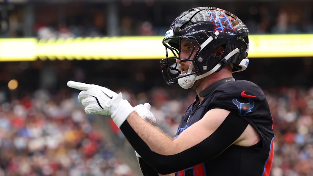 Jan 4, 2026; Houston, Texas, USA;  Houston Texans tight end Dalton Schultz (86) reacts after a catch against the Indianapolis Colts during the first half at NRG Stadium.