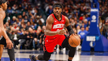 Dec 6, 2025; Dallas, Texas, USA; Houston Rockets Guard Aaron Holiday (0) dribbles during the second quarter against the Dallas Mavericks at American Airlines Center. Mandatory Credit: Andrew Dieb-Imagn Images