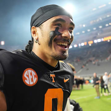 Former Tennessee quarterback Nico Iamaleava (8) walks off the field after the win over Kentucky.