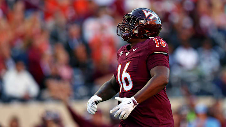 Sep 7, 2024; Blacksburg, Virginia, USA; Virginia Tech Hokies defensive lineman Aeneas Peebles (16) celebrates after a sack during the second quarter against the Marshall Thundering Herd at Lane Stadium. Mandatory Credit: Peter Casey-Imagn Images