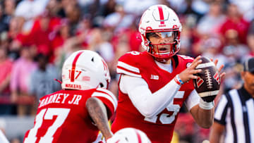 Sep 7, 2024; Lincoln, Nebraska, USA; Nebraska Cornhuskers quarterback Dylan Raiola (15) hands the ball off to wide receiver Jacory Barney Jr. (17) against the Colorado Buffaloes during the first quarter at Memorial Stadium.