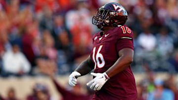 Sep 7, 2024; Blacksburg, Virginia, USA; Virginia Tech Hokies defensive lineman Aeneas Peebles (16) celebrates after a sack during the second quarter against the Marshall Thundering Herd at Lane Stadium. Mandatory Credit: Peter Casey-Imagn Images